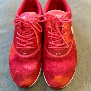 Nike Hot Pink Sneakers with Orange Accents Vibrant Design